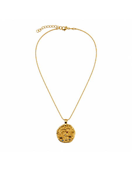 Collar dorado inspirado en los signos del zodiaco con medallón grabado.