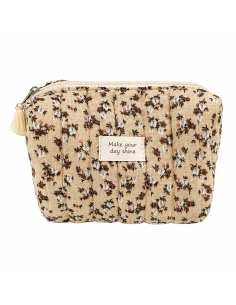 Neceser acolchado de algodón con estampado floral vintage y detalle de borla decorativa.